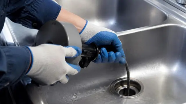 Drain cleaning by a South Florida Plumbing technician